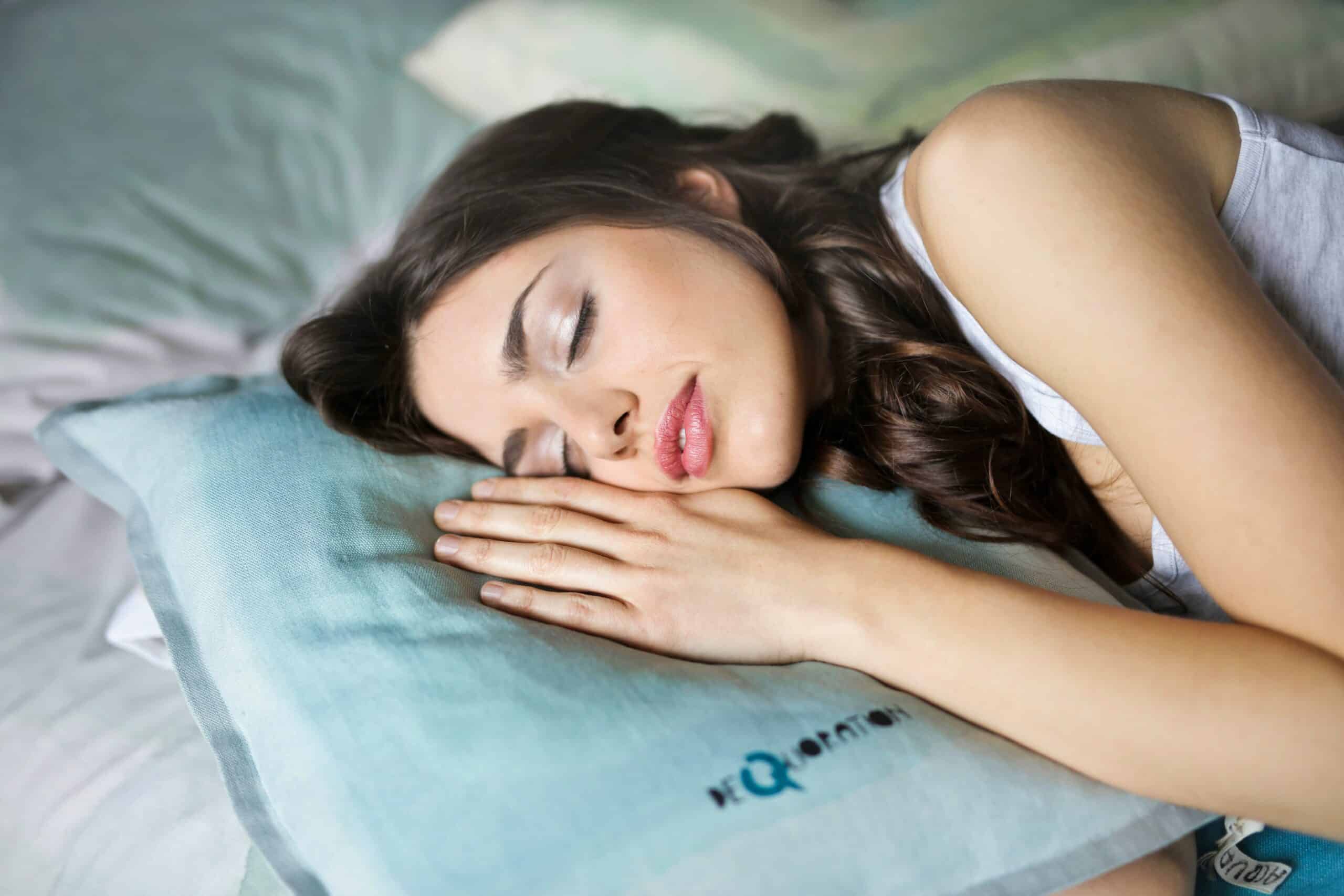 Woman Asleep with head on pillow